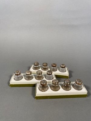 a lot of silver objects sitting on a gray surface
