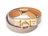 a close up of a bracelet on a white background