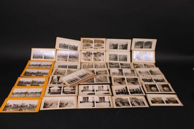 several old black and white photos of a bunch of buildings