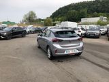 many cars parked in a parking lot in a parking lot