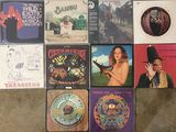 a lot of music cds and cds on the floor