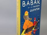 a book that has a picture of a man on a boat