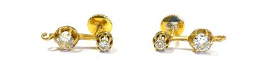pair of yellow gold plated earrings with clear crystal stones