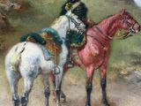 two horses that are standing on a dirt road