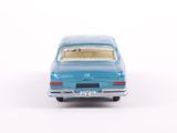a toy car that is sitting on a white surface