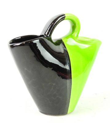 a black and green vase with a handle on a white background