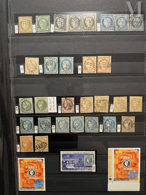 many stamps on display in a glass case