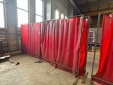 a room that has a red curtain in it