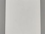 a white spiral notebook with a pen on top of it