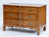 an image of a wooden chest of drawers with a marble top