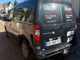 a van that is parked on the side of the road