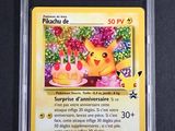 an image of a pokemon card in a plastic case
