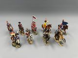 sept figurines représentant des soldats à cheval tenant des drapeaux