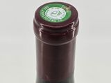 a bottle of wine that is sitting on a table
