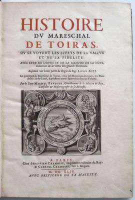 un vieux livre avec l'image d'un oiseau