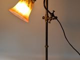 an image of a lamp that is on top of a table