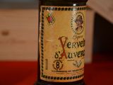 a bottle of beer that is sitting on a table