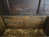 a wooden chest with a wooden lid and a wooden floor