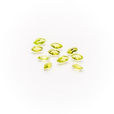 a group of yellow sapphires on a white background