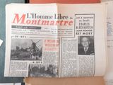 a newspaper with a picture of a man on it