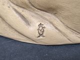 a close up of a statue of a person on a skateboard