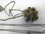 a necklace with a bunch of beads attached to it