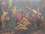 a painting on the wall of a building that has a painting on it