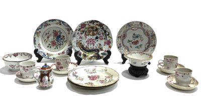 many plates and cups that are sitting on a table