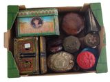 a box of assorted items in it on a white surface