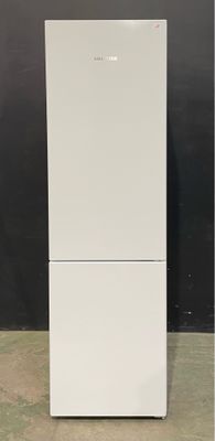 a white refrigerator that is sitting on the floor