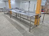 a long table in the middle of a large room