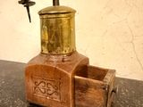 a small coffee grinder sitting on a table