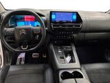 a picture of the interior of a car with a touch screen