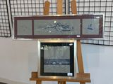 a picture of an easel with a painting on it