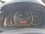 a close up of a car dashboard with a speedometer and gauges