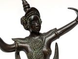 an image of a statue of a woman holding a knife in her hand