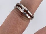 sterling silver stacking ring set with a single diamond