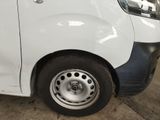 a white van that is parked in a garage