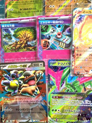 many different types of pokemon cards displayed on a table