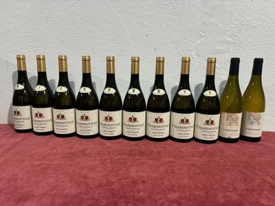 a group of bottles of wine sitting on top of a table