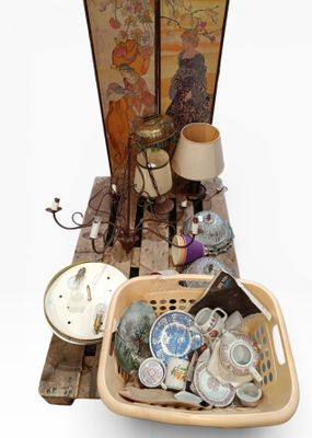 a basket full of assorted items sitting on a table
