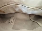a close up of a purse with a zipper on it