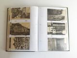 an open book with pictures of old buildings on it