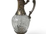 an image of a silver and glass vase on a white background