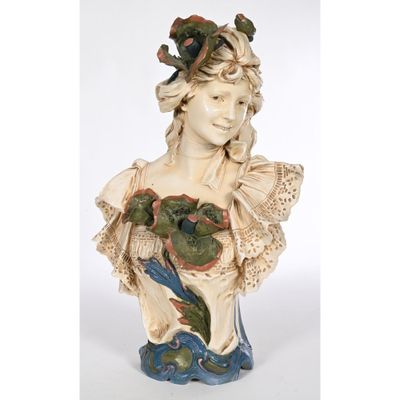 an image of a statue of a woman with a bird on her shoulder