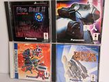 four different video games on the table