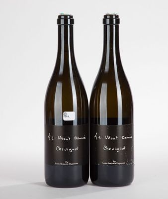 two bottles of wine are sitting next to each other on a white surface