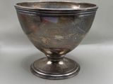 an image of a silver bowl on a pedestal on a white background