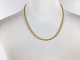 a gold chain necklace on a mannequin mannequin mannequin mannequin mannequin mannequin mannequin mannequin manne