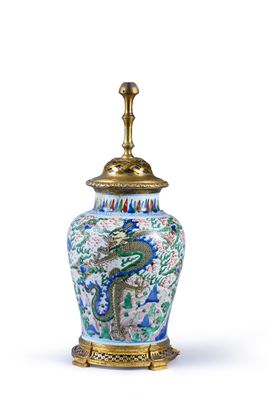 an image of a blue and white vase with a dragon on it